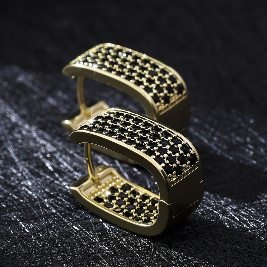 A pair of elegant, understated, and luxurious earrings featuring a U-shaped design with dense-set synthetic zirconia