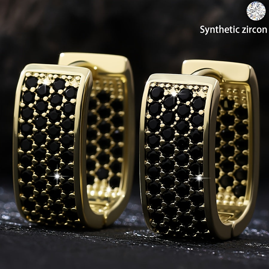 A pair of elegant, understated, and luxurious earrings featuring a U-shaped design with dense-set synthetic zirconia