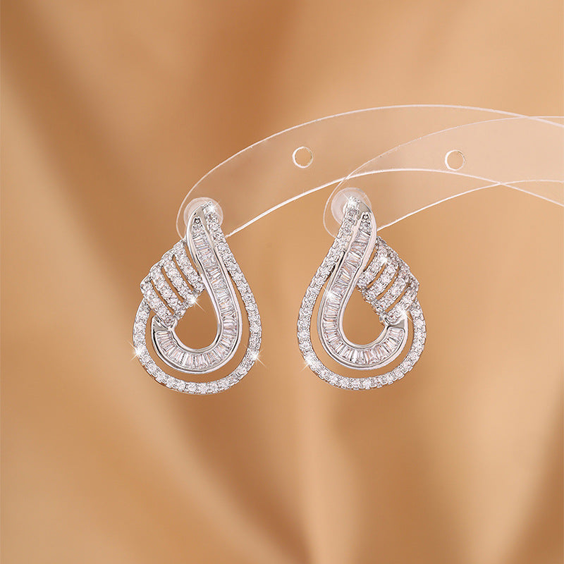 Luxurious stud earrings with fully set and ultra-shiny zirconia