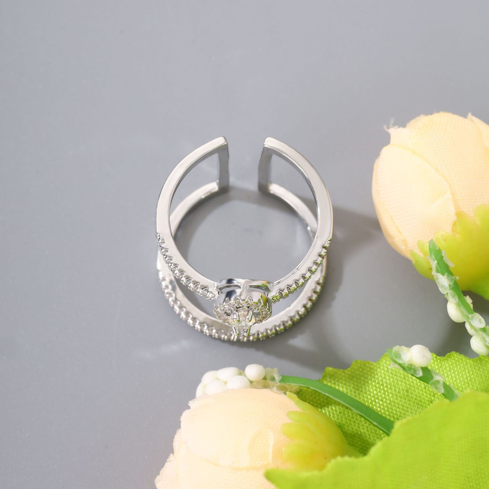 Geometric hollow-out exaggerated ring with zircon inlay