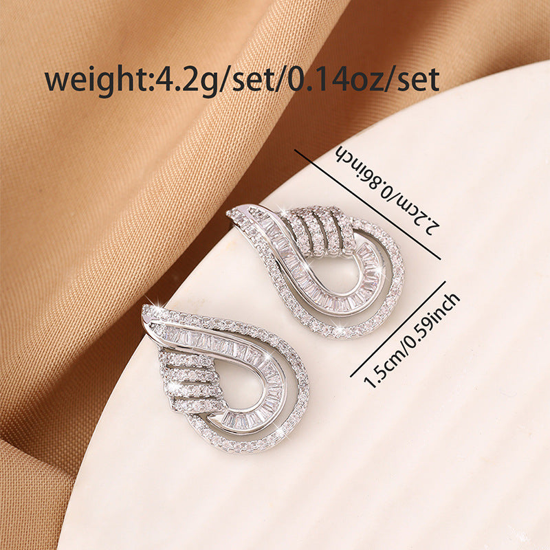 Luxurious stud earrings with fully set and ultra-shiny zirconia