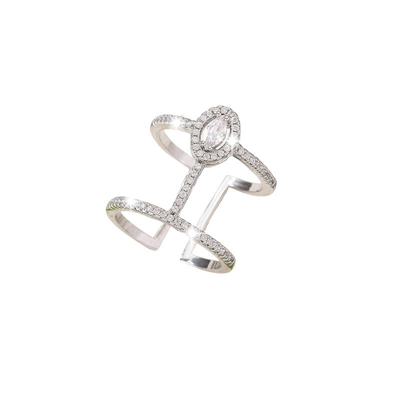 Geometric hollow-out exaggerated ring with zircon inlay